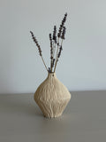 Narrow neck seedpod vase