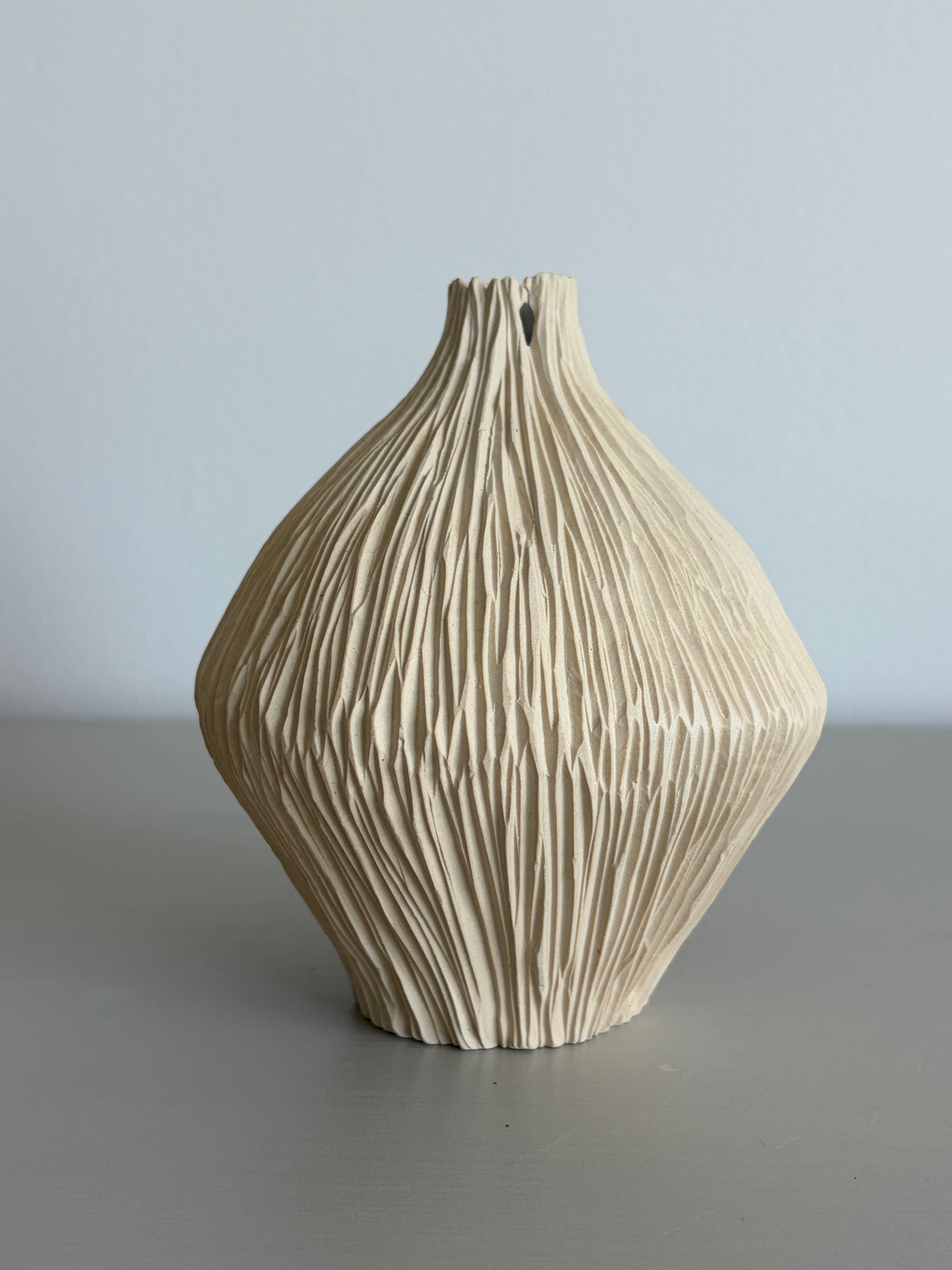Narrow neck seedpod vase