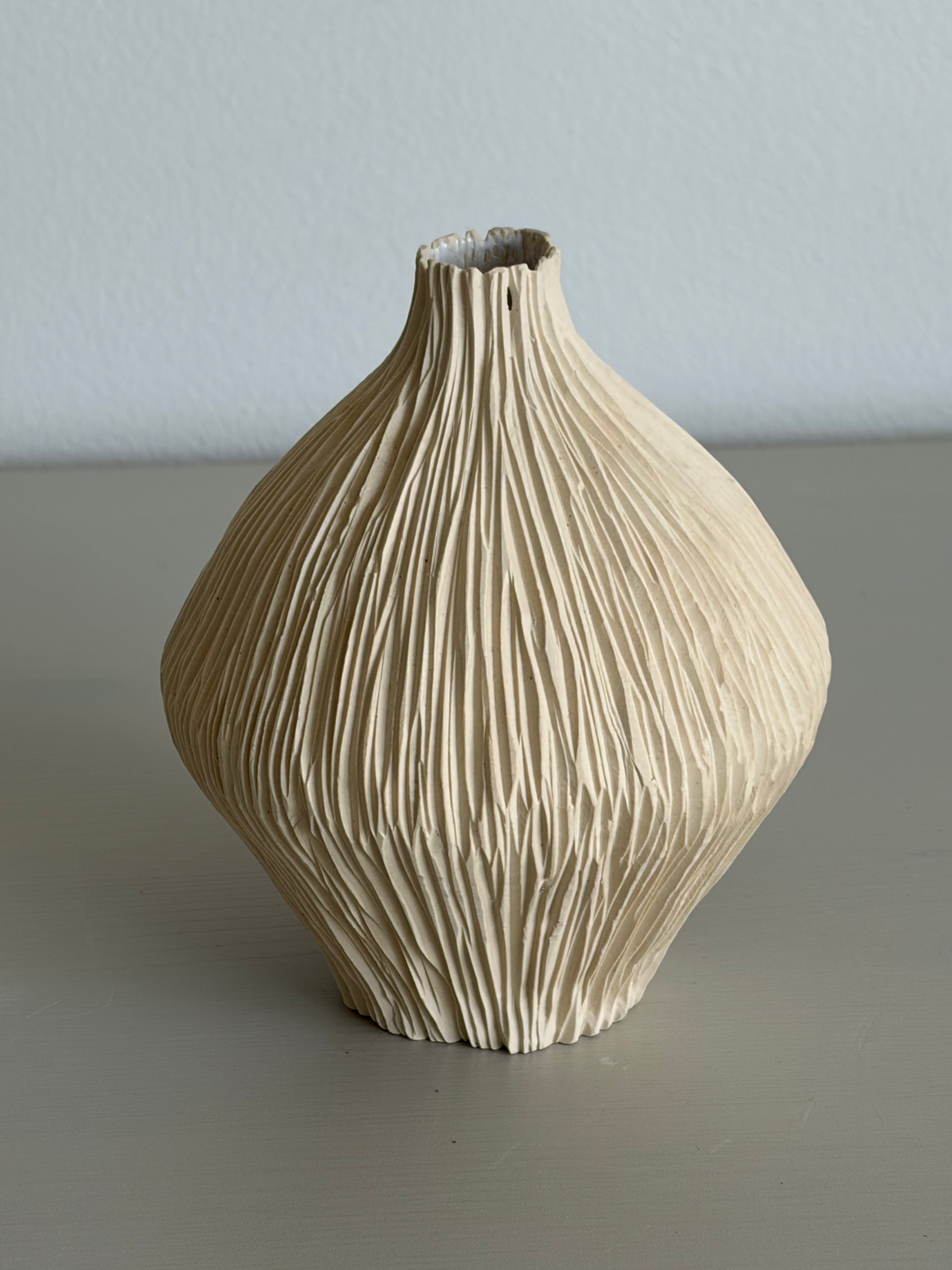 Narrow neck seedpod vase