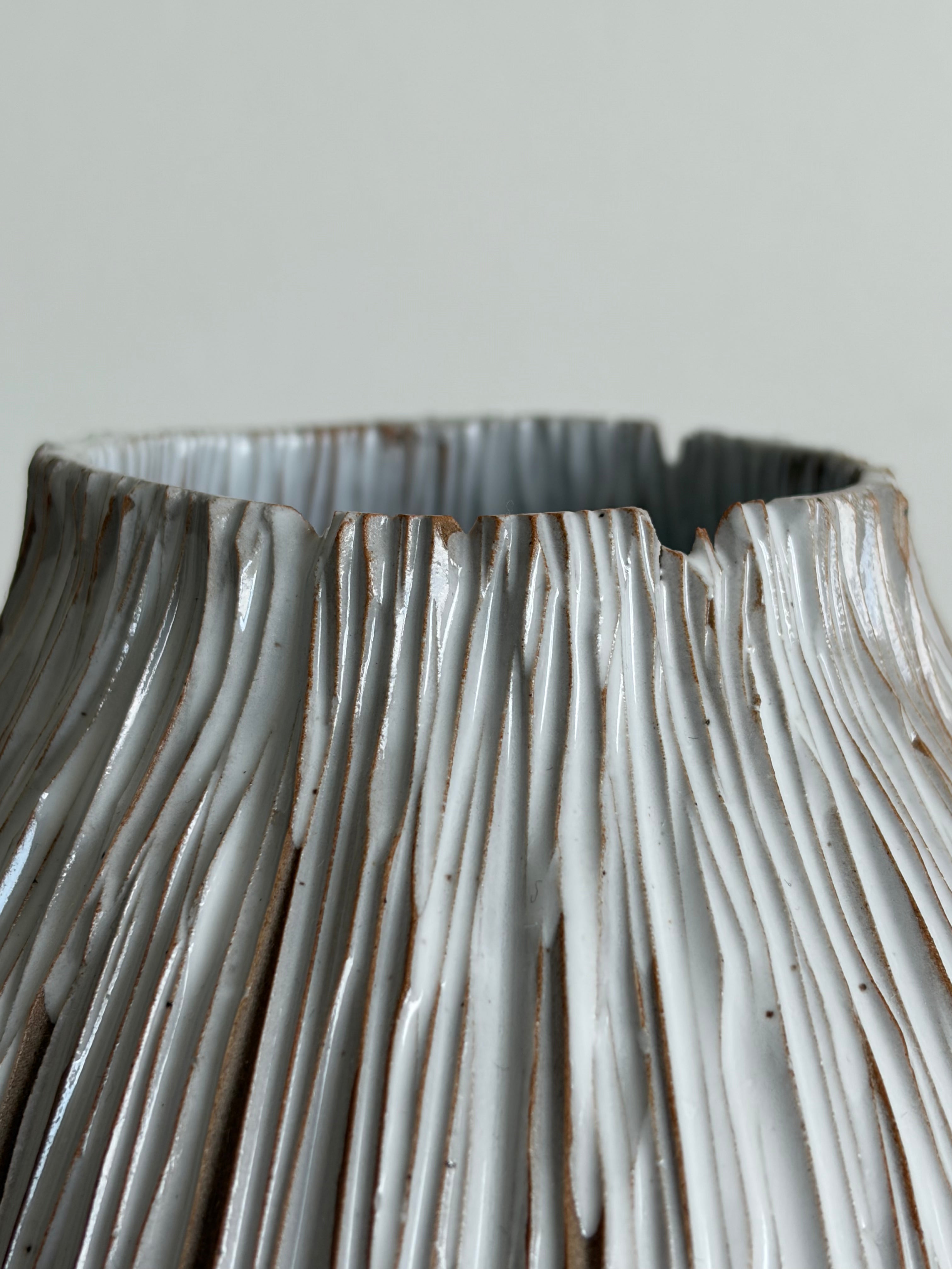 Glaze-drip seedpod vase